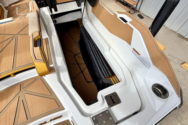 Slide: The Image of 2025 Nautique Super Air Nautique G25 Paragon interior storage compartment with luxurious seating. - 41