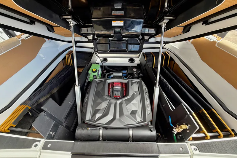 Slide: The Image of Engine compartment of 2025 Nautique Super Air Nautique G25 Paragon boat. - 43