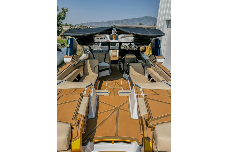 Slide: The Image of 2025 Nautique Super Air Nautique G25 Paragon interior with luxurious seating and modern design. - 5