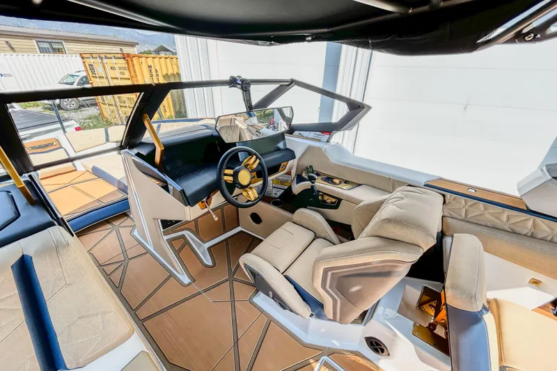 Slide: The Image of Luxurious interior of 2025 Nautique Super Air Nautique G25 Paragon boat. - 7