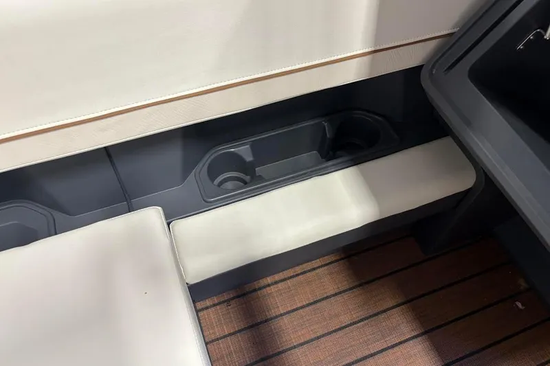 Slide: The Image of Interior seating and cup holders of 2023 Manitou EXPLORE 26 SHP 575 boat. - 6