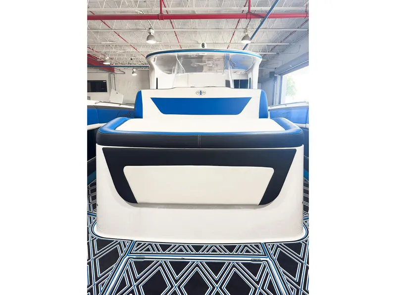 Slide: The Image of 2018 Cigarette GTO boat interior with modern design and blue accents. - 3