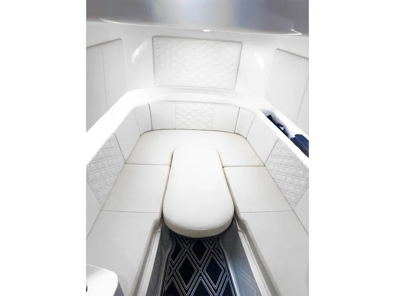 Slide: The Image of Luxurious white interior of 2018 Cigarette GTO boat cabin. - 4