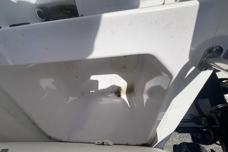 Slide: The Image of 1997 Boston Whaler Outrage 20 boat interior detail, showing white fiberglass structure. - 14