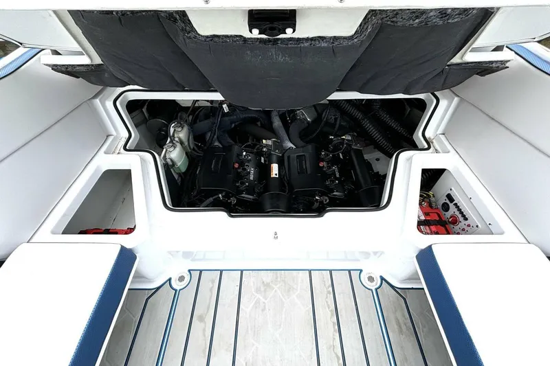 Slide: The Image of 2020 Scarab 255 ID Wake engine compartment, showcasing interior components and seating layout. - 40