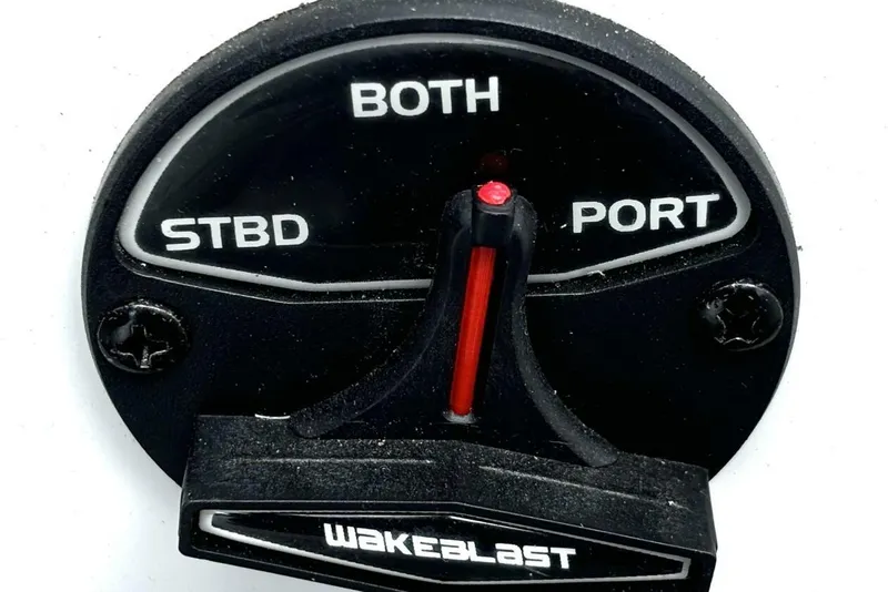 Slide: The Image of 2020 Scarab 255 ID Wake control switch labeled "STBD," "PORT," and "BOTH." - 25