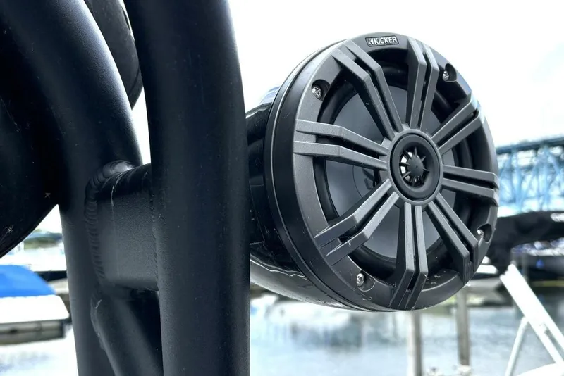 Slide: The Image of Kicker speaker on 2020 Scarab 255 ID Wake boat, dockside view. - 36