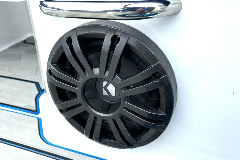 Slide: The Image of Close-up of a speaker on a 2020 Scarab 255 ID Wake boat. - 37