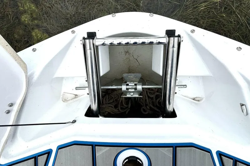 Slide: The Image of 2020 Scarab 255 ID Wake boat anchor storage with stainless steel fittings. - 30