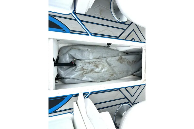 Slide: The Image of Storage compartment of 2020 Scarab 255 ID Wake boat with interior view. - 35