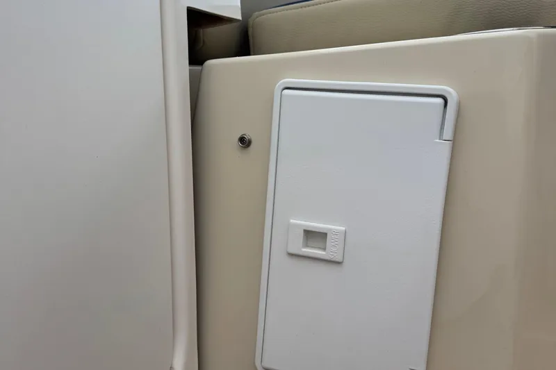 Slide: The Image of 2022 Ranger Tugs R-31 CB interior detail with white compartment door. - 21