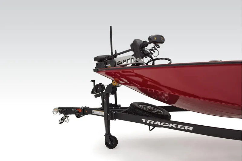 Slide: The Image of 2026 Tracker Savage 215 boat interior with dual seats and steering console. - 6