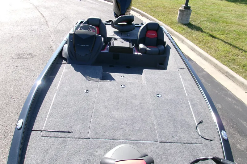 Slide: The Image of 2026 Tracker Savage 215 boat with spacious deck and comfortable seating. - 62