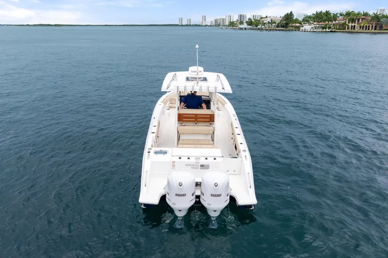 Slide: The Image of 2019 Pursuit S 288 Sport boat with Yamaha engines on the water. - 7