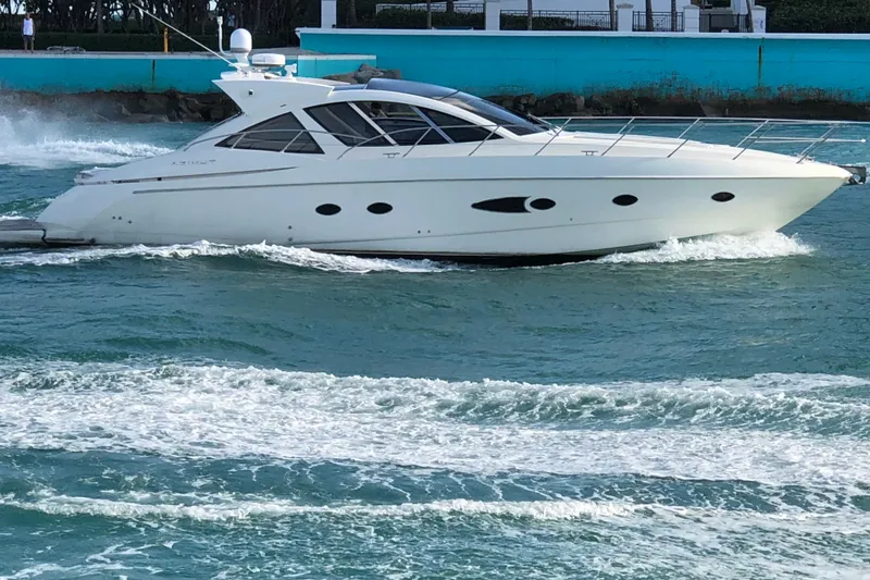 The Image of 2010 Azimut Atlantis 54 yacht cruising on open water. - 1