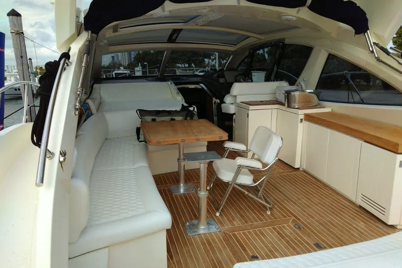 Slide: The Image of Luxurious 2010 Azimut Atlantis 54 yacht interior with elegant seating and wooden flooring. - 10
