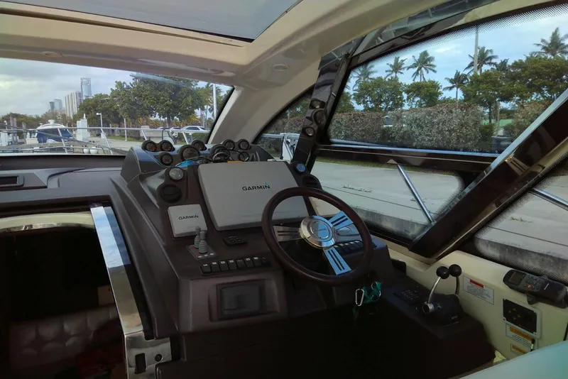Slide: The Image of Cockpit of 2010 Azimut Atlantis 54 yacht with Garmin navigation system. - 14