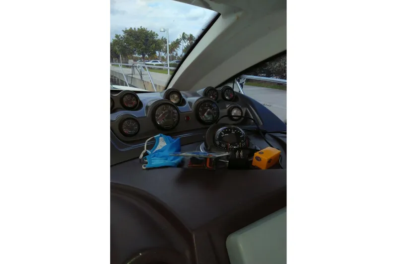 Slide: The Image of Dashboard of 2010 Azimut Atlantis 54 yacht with gauges and controls. - 16