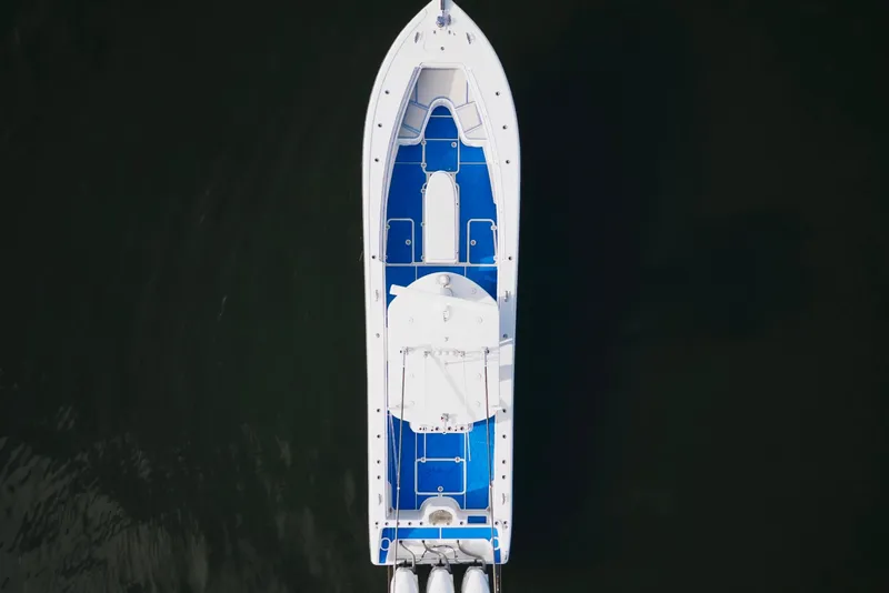 Slide: The Image of Aerial view of 2007 Yellowfin 36 Offshore boat on dark water. - 11