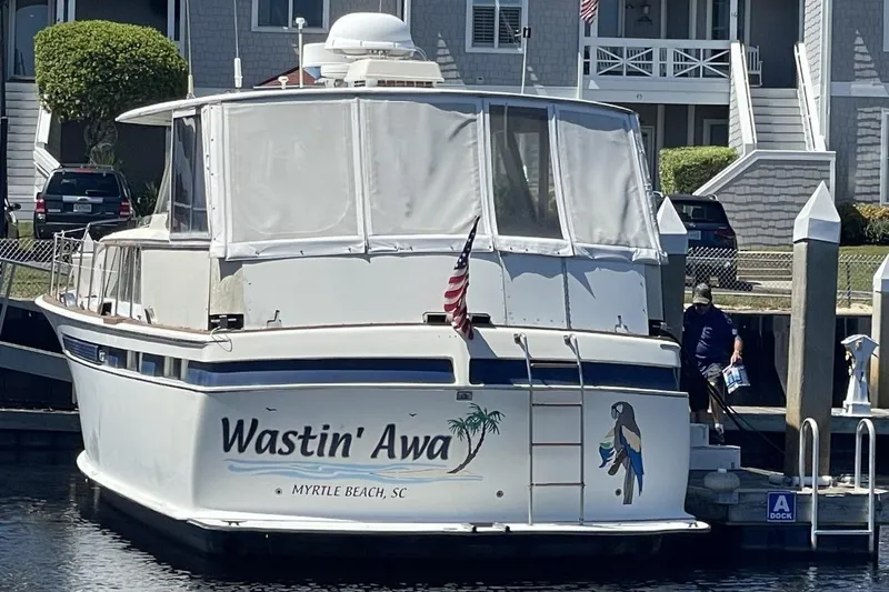 Slide: The Image of 1969 Chris-Craft 47 Commander yacht docked, named "Wastin' Awa," Myrtle Beach, SC. - 3