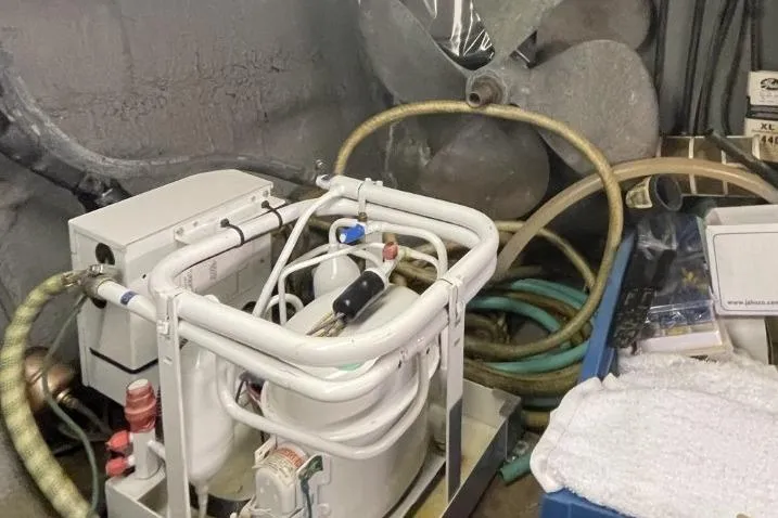 Slide: The Image of Engine room of 1969 Chris-Craft 47 Commander with mechanical equipment and propeller. - 43