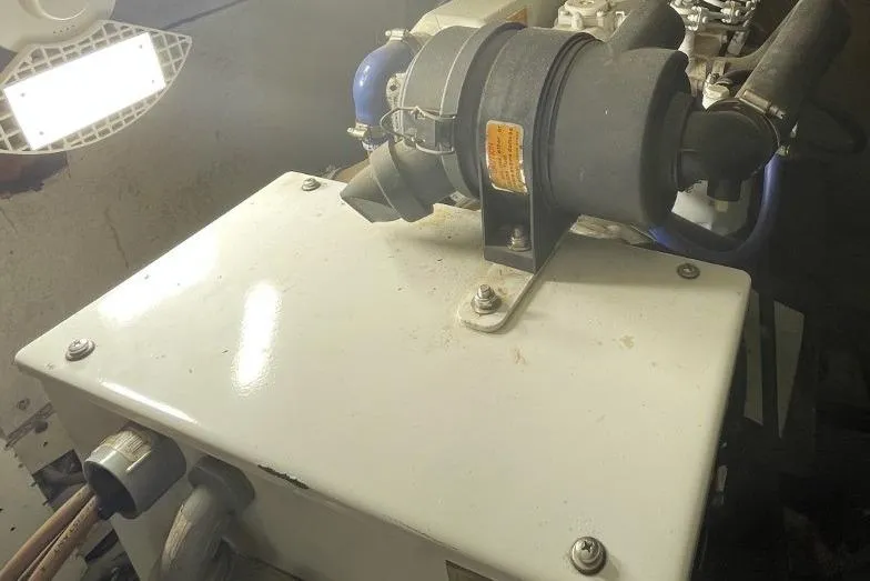 Slide: The Image of Engine compartment of 1969 Chris-Craft 47 Commander with visible components and lighting. - 45