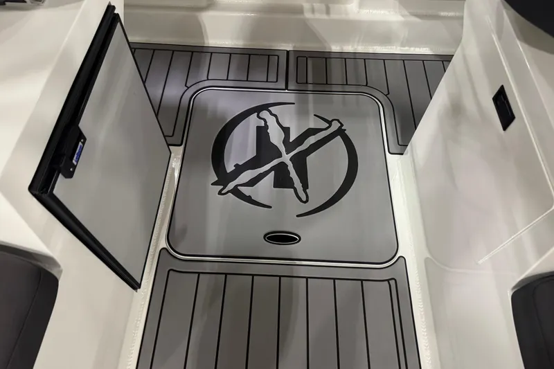 Slide: The Image of 2026 Extreme Boats 696 Game King interior with custom flooring and logo design. - 17