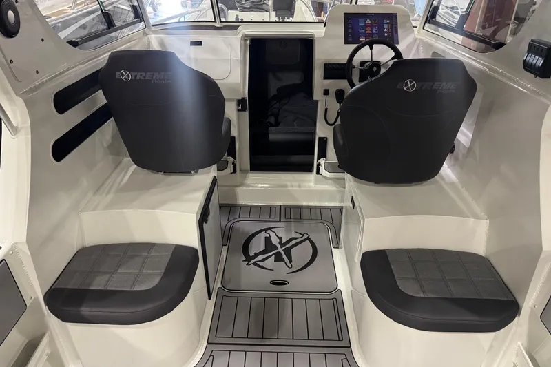 Slide: The Image of Interior of 2026 Extreme Boats 696 Game King, featuring modern seating and dashboard. - 8