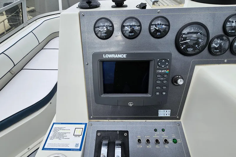 Slide: The Image of Control panel of a 1990 Carver 3467 Santego boat with Lowrance electronics. - 15