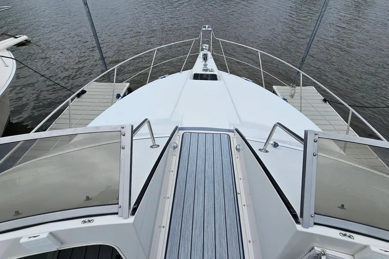 Slide: The Image of 1990 Carver 3467 Santego yacht deck view at marina. - 16