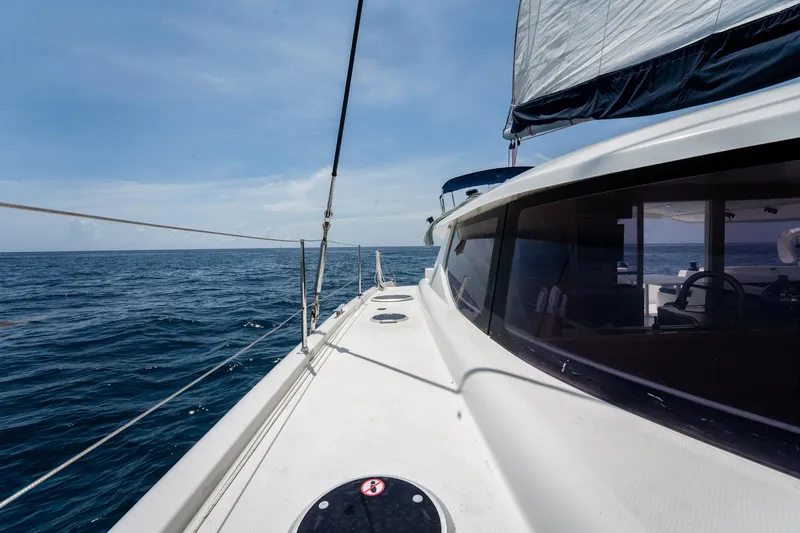 Slide: The Image of Sailing on a 2008 Fountaine Pajot Salina 48 Evolution catamaran in open sea. - 49