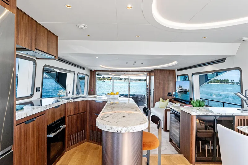 Slide: The Image of Luxurious interior of 2025 Aquitalia 78 Fly yacht with modern kitchen design. - 15