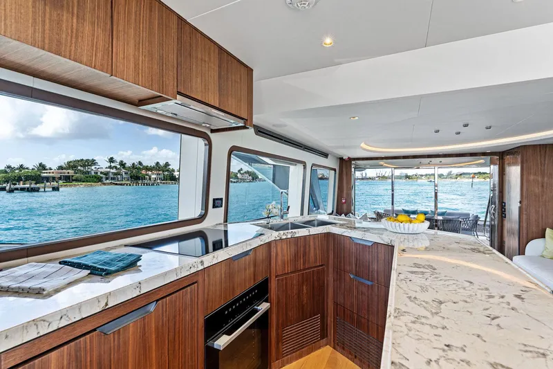 Slide: The Image of Luxurious interior of 2025 Aquitalia 78 Fly yacht with modern kitchen and ocean view. - 17