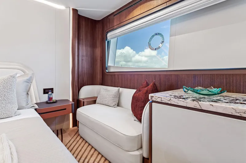 Slide: The Image of Luxurious interior of 2025 Aquitalia 78 Fly yacht with elegant seating and modern decor. - 25