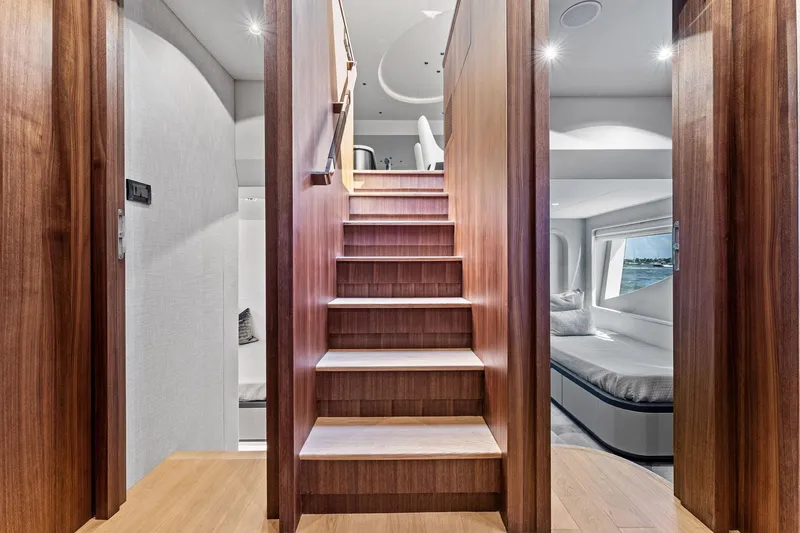 Slide: The Image of Luxurious interior of 2025 Aquitalia 78 Fly yacht with wooden staircase and modern design. - 33