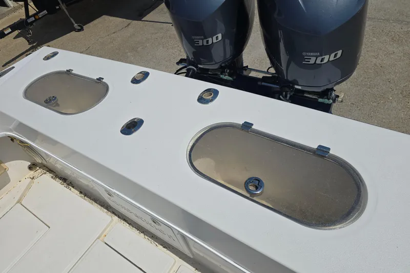 Slide: The Image of 2007 Competition 31 boat with dual Yamaha 300 engines and livewell compartments. - 26