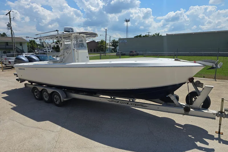 Slide: The Image of 2007 Competition 31 boat with center console and fishing rod holders. - 5