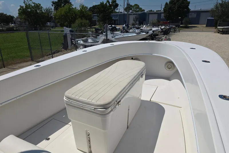 Slide: The Image of 2007 Competition 31 boat with center console and seating, docked outdoors. - 6