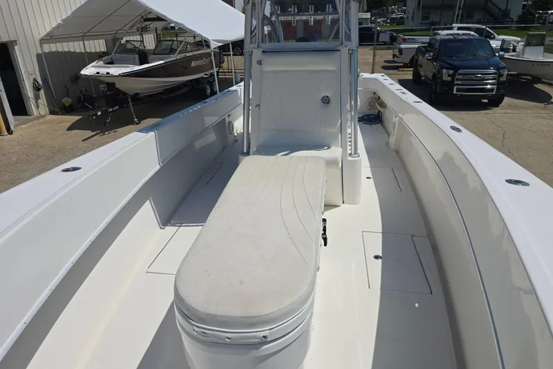 Slide: The Image of 2007 Competition 31 boat on display in a marina under clear blue skies. - 7