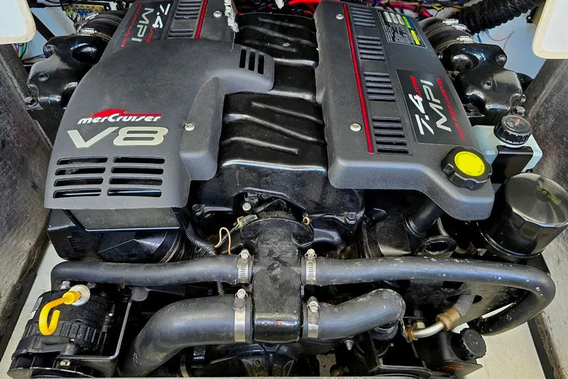 Slide: The Image of 1999 Mariah Shabah Z250 Cuddy Cabin engine, featuring a MerCruiser V8 7.4 MPI. - 14