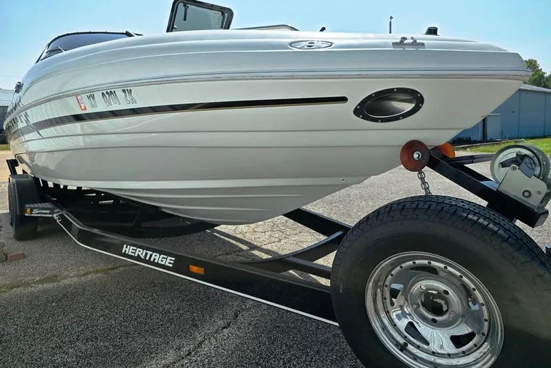 Slide: The Image of 1999 Mariah Shabah Z250 Cuddy Cabin boat on trailer, side view. - 16