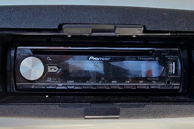 Slide: The Image of Pioneer stereo system in 1999 Mariah Shabah Z250 Cuddy Cabin boat dashboard. - 20