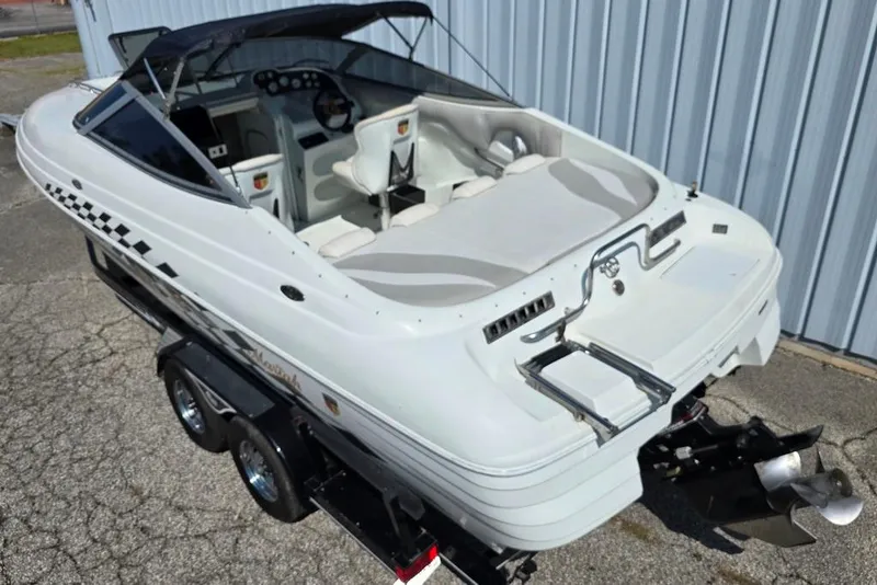 Slide: The Image of 1999 Mariah Shabah Z250 Cuddy Cabin boat on trailer, rear view. - 23