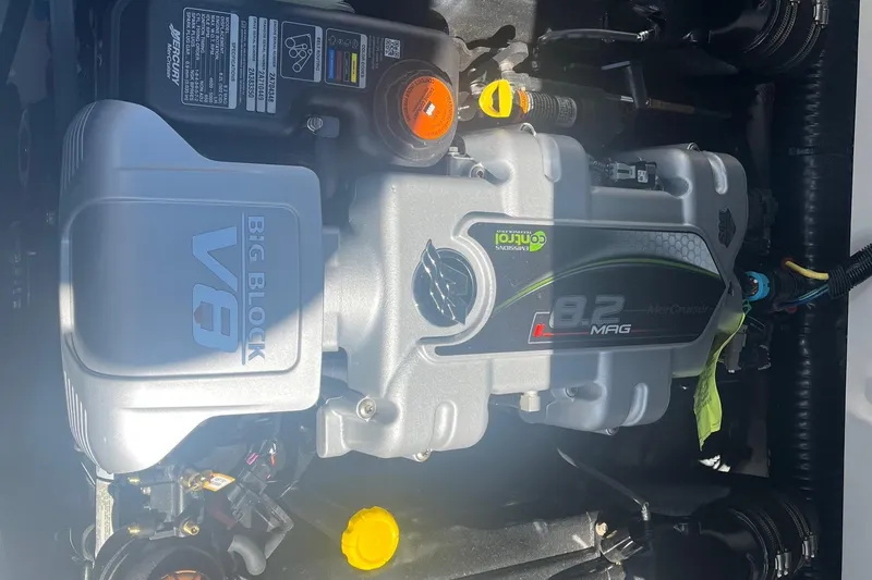 Slide: The Image of 2022 Chaparral 307 SSX engine, featuring a powerful MerCruiser 8.2 MAG V8. - 2