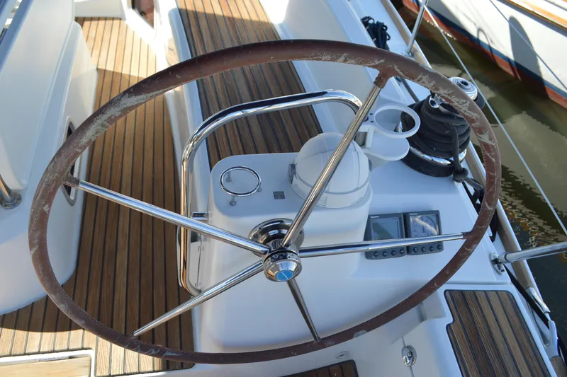 Slide: The Image of Steering wheel of 2008 Jeanneau Sun Odyssey 45 DS sailboat with teak deck. - 14