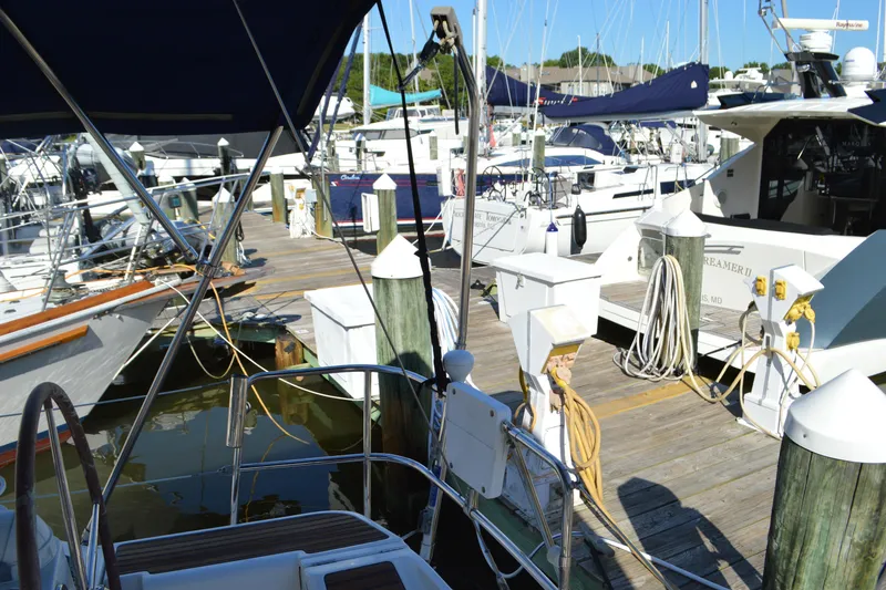 Slide: The Image of Marina with Jeanneau Sun Odyssey 45 DS, 2008 model, docked among other boats. - 19
