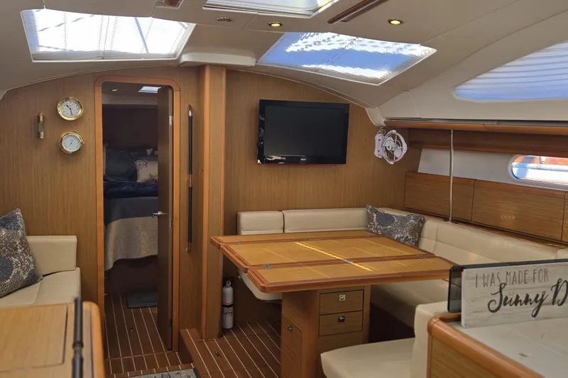 Slide: The Image of Luxurious interior of 2008 Jeanneau Sun Odyssey 45 DS sailboat with elegant wood finish. - 43