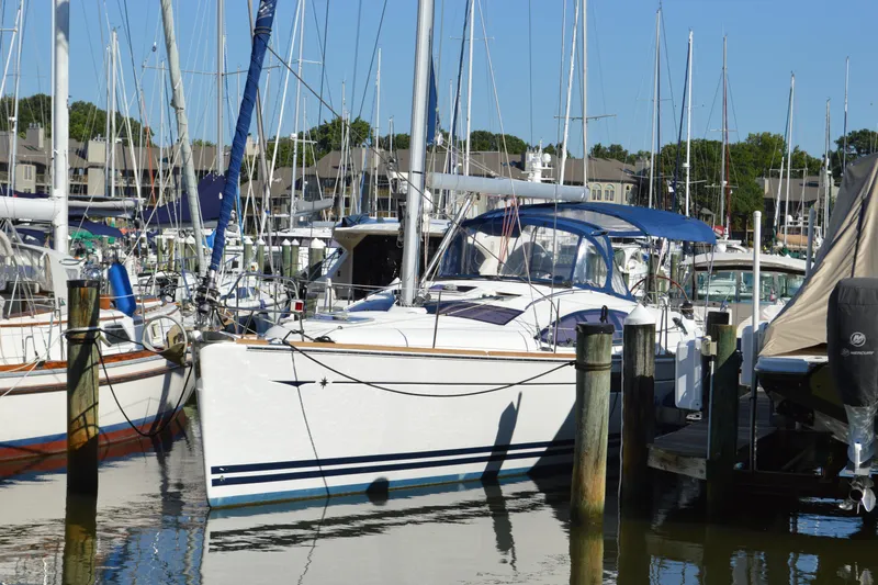 Slide: The Image of 2008 Jeanneau Sun Odyssey 45 DS sailboat docked in a marina. - 5