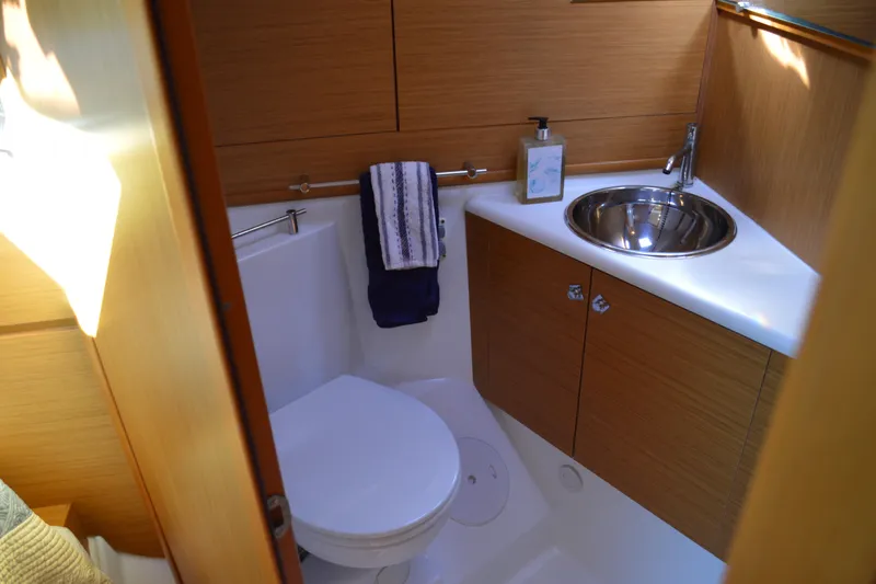 Slide: The Image of Bathroom interior of 2008 Jeanneau Sun Odyssey 45 DS yacht, featuring sink and toilet. - 69