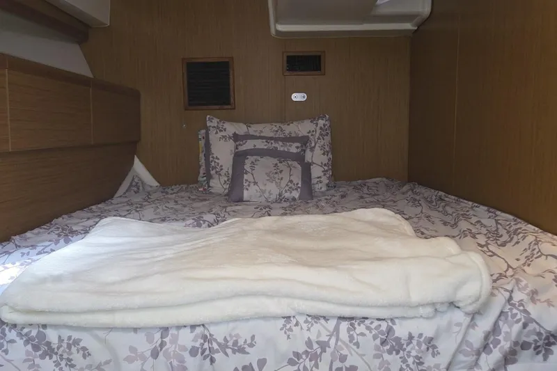 Slide: The Image of Cozy cabin interior of 2008 Jeanneau Sun Odyssey 45 DS with floral bedding. - 79